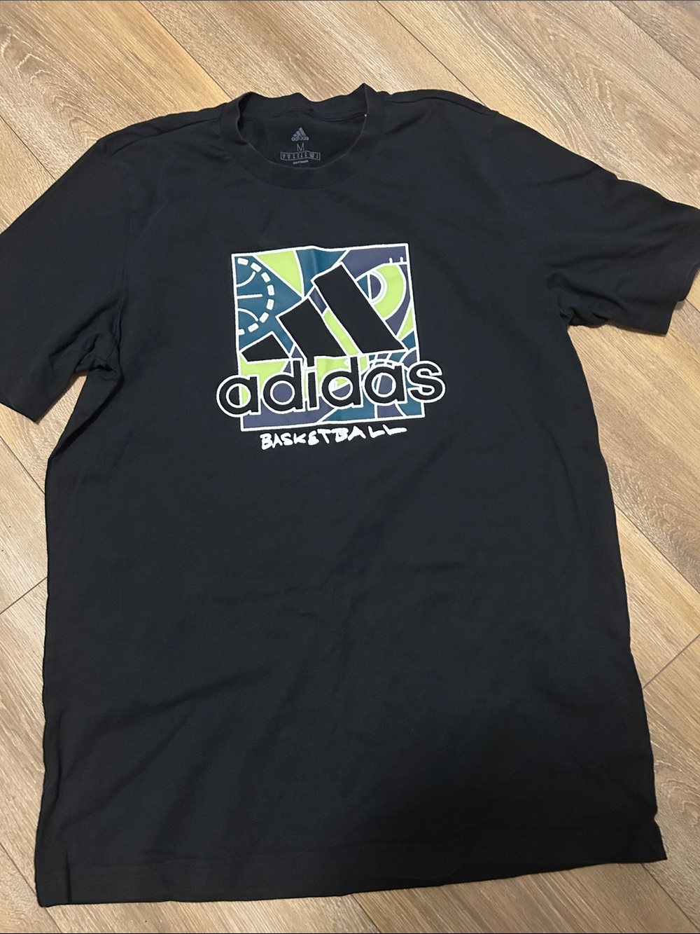 adidas Black Short-Sleeve Basketball Graphic Tee with Green & Blue Logo